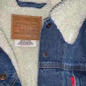 Levi’s Sherpa trucker jean jacket.